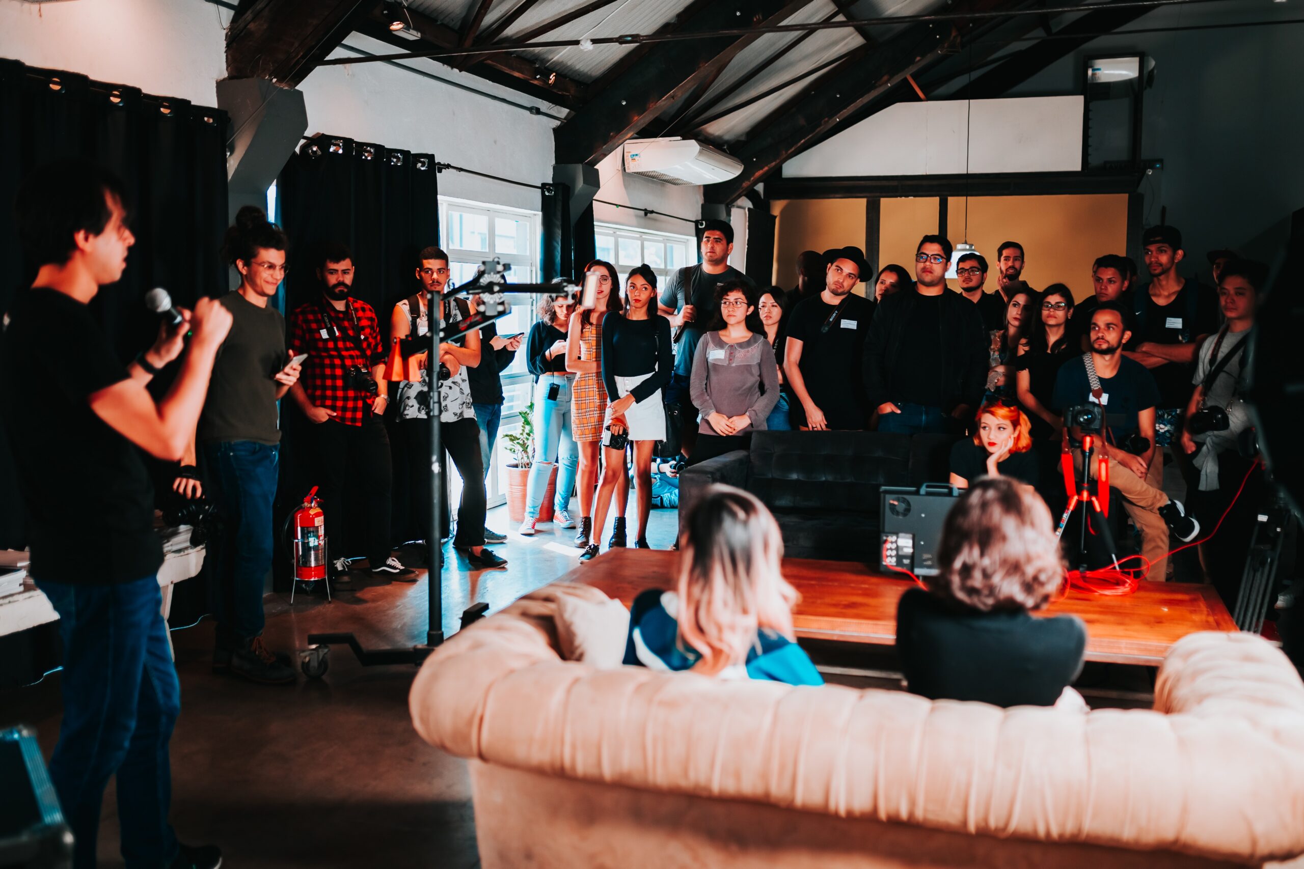 Photo by Matheus Bertelli: https://www.pexels.com/photo/group-of-people-standing-inside-room-2608517/